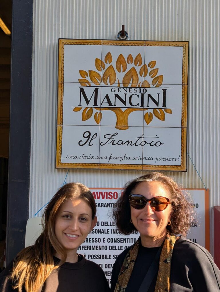 At Frantoio Genesio Mancini with Fausta, who carries on her family’s tradition of producing certified organic extra‑virgin olive oil, just as her father Genesio began in 1958.