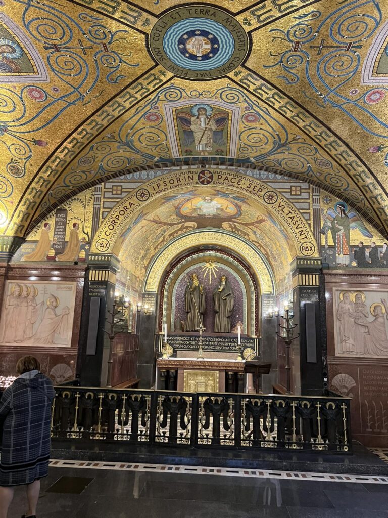 The Crypt beneath the main altar. During the post WWII reconstruction, the deteriorated frescoes were replaced with these golden mosaics designed and executed by monks from the Beuron art school in Germany, a project that took 12 years to complete.